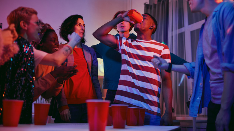 People playing drinking game