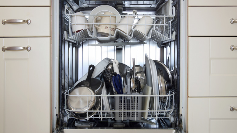 Clean dishes in dishwasher