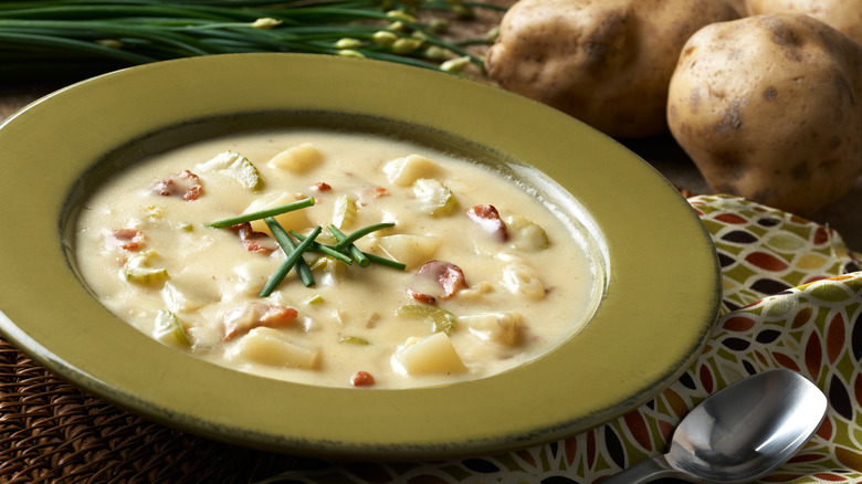 chunky potato soup with chives and bacon bits