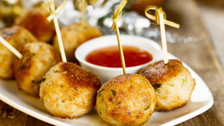Turkey meatballs with toothpicks and dipping sauce