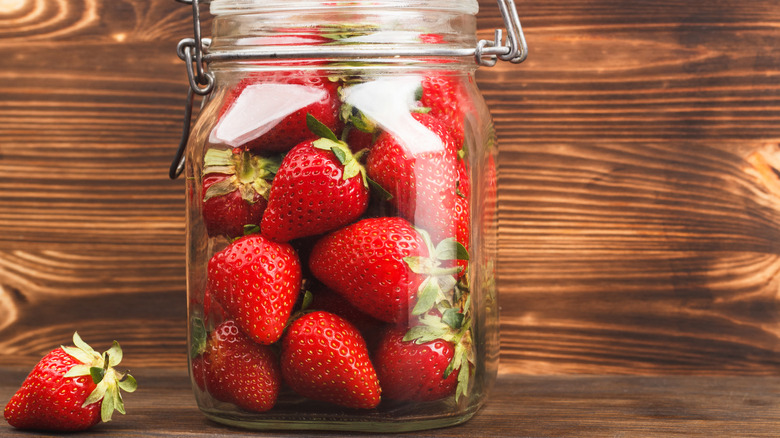 Strawberries in a sealed glass jar