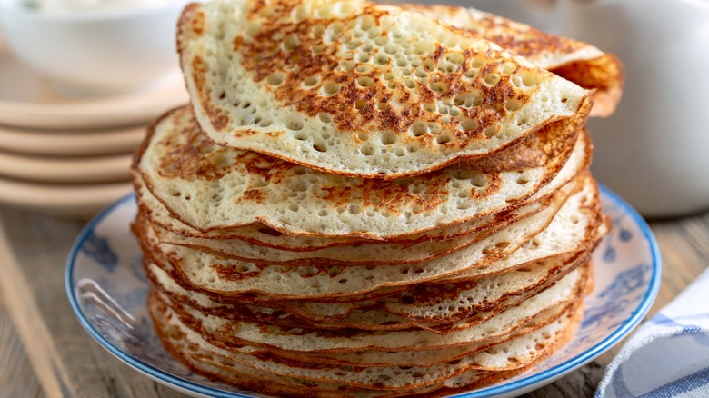 stack of pancakes on blue plate