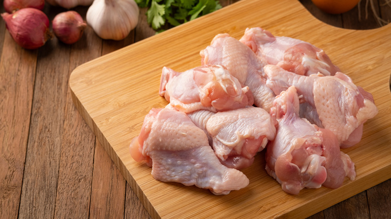 chicken wings on cutting board