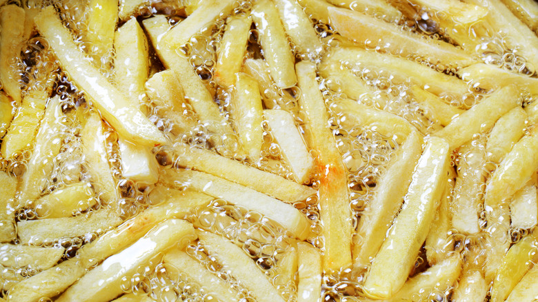 fries frying in oil