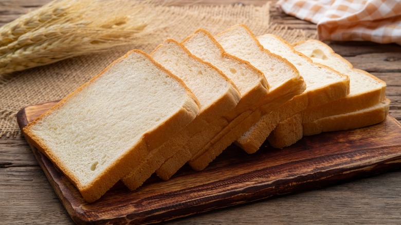 Slices of sandwich bread on board