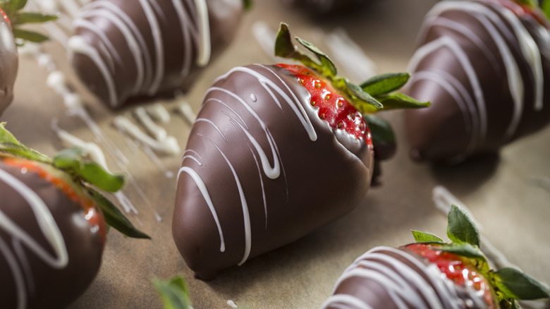 Chocolate-covered strawberries with drizzle pattern