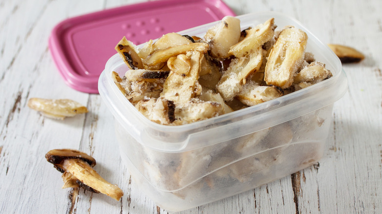 Frozen mushrooms in container