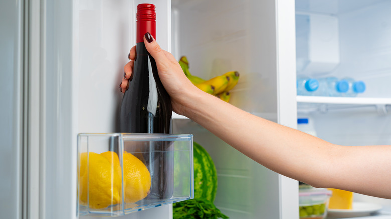 Red wine bottle in fridge