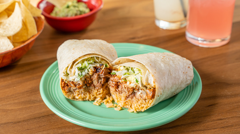 Chicken burrito with chips and agua fresca