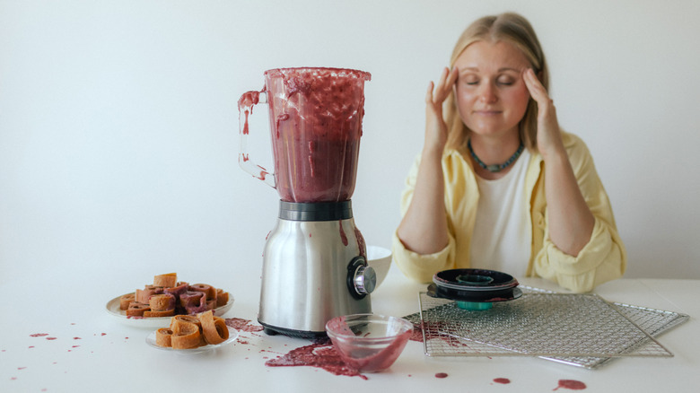 Someone displays frustration over a dysfunctional blender.