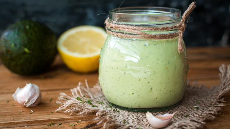 Salad dressing made with avocado, garlic, and lemon