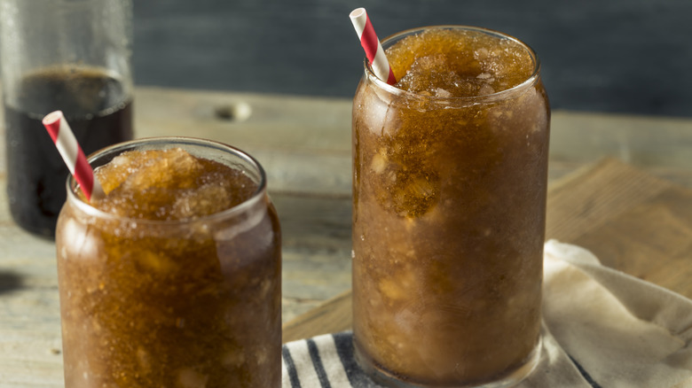 Soda pop slushies in glasses.