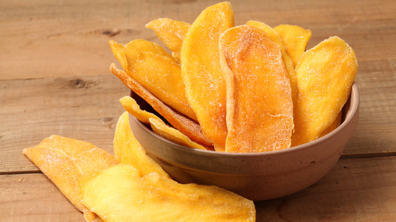 bowl of dried mango with sugar