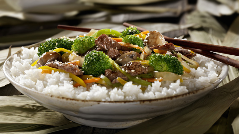 Beef stir fry on top of rice