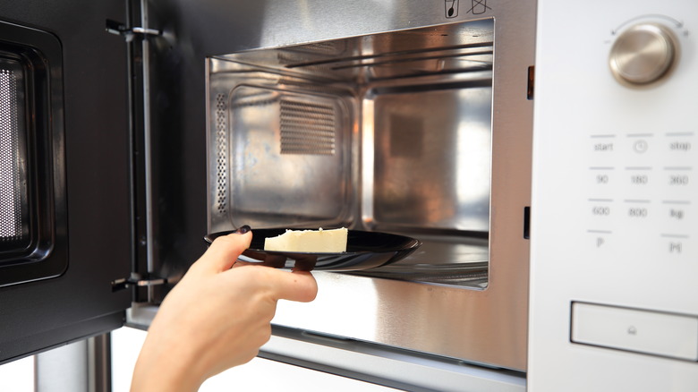 Putting butter in the microwave