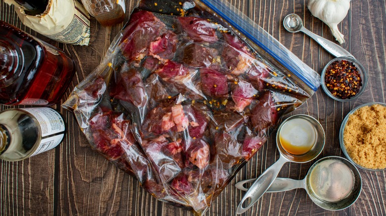 Steak marinading in a plastic bag