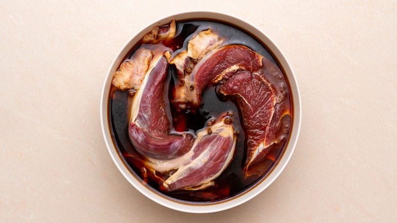 Meat in bowl with marinade