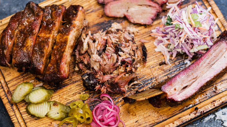 Onion, pickles, brisket, and sauce