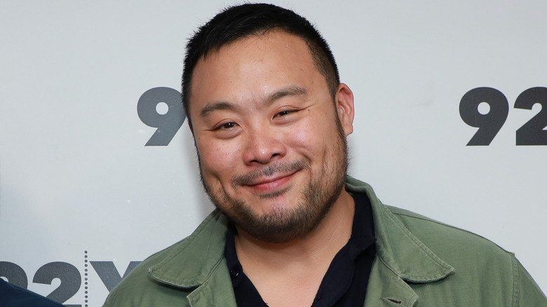 David Chang smiling on red carpet