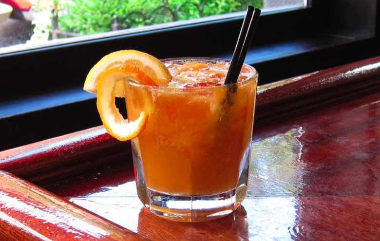 This simple version of an Old Fashioned has both lemon and orange flavors.