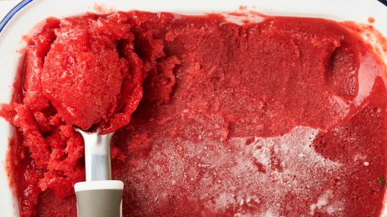 Scooping berry sorbet
