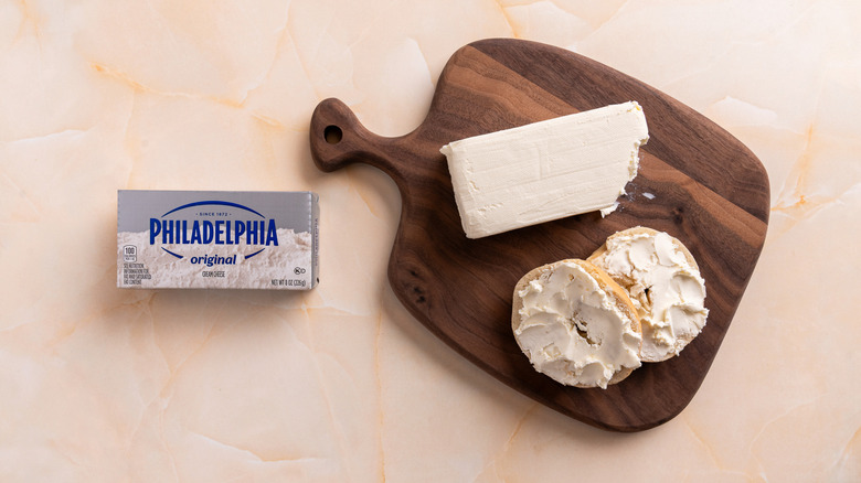 Philadelphia cream cheese spread on a bagel