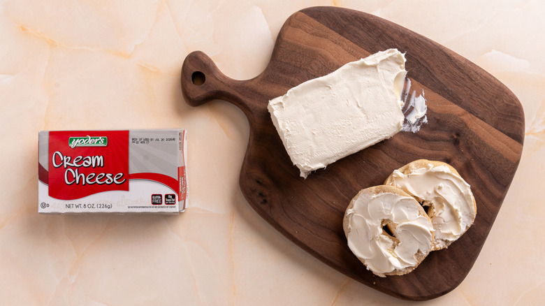 Yoder's cream cheese spread on a bagel