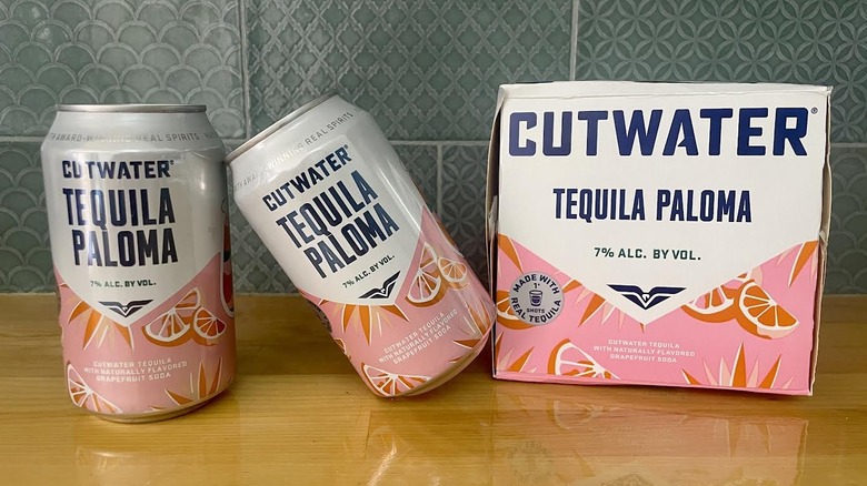 A box and two cans of Cutwater Tequila Paloma cocktails