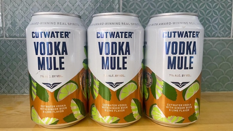 Three cans of Cutwater's Vodka Mule cocktails