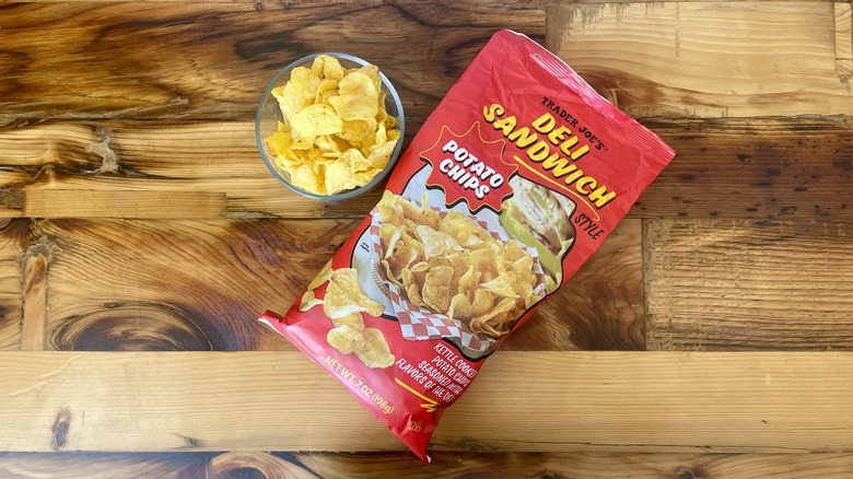 Overhead view of Deli Sandwich Potato Chips on a wooden table top