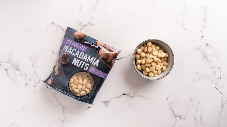 bag and a bowl of macadamia nuts