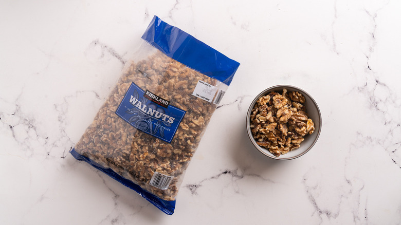 bag and a bowl of walnuts