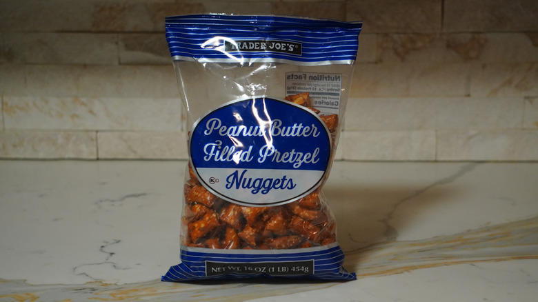 Bag of Trader Joe's Peanut Butter Filled Pretzel Nuggets on marble countertop