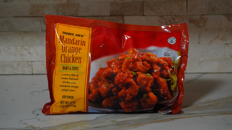Package of Trader Joe's Mandarin Orange Chicken on marble countertop