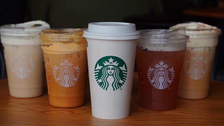 Starbucks' Iced Banana Bread Chai, Iced Pumpkin Cream Shaken Espresso, Pumpkin Spice Chai, Iced Chaider, and Iced Banana Bread Latte (left to right).