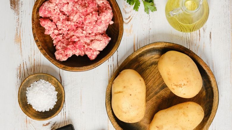 Raw ground beef and potatoes.