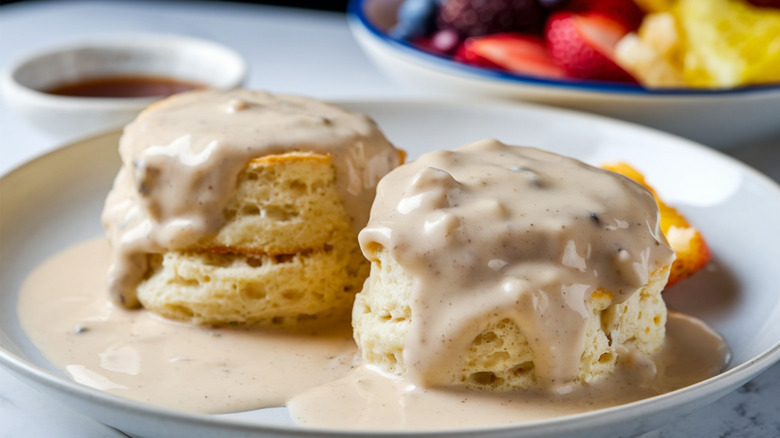 A plat of biscuits and sausage gravy