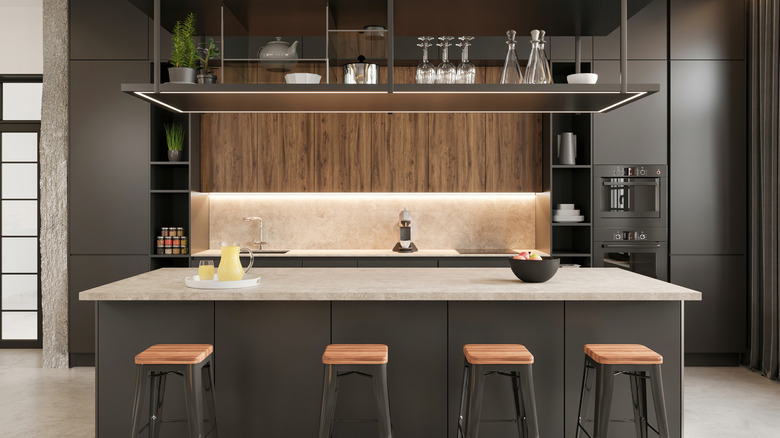 A sleek, modern kitchen with under-cabinet lighting