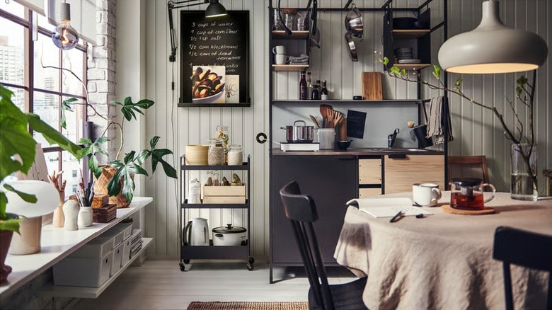 An Ikea kitchenette is shown installed in an urban apartment