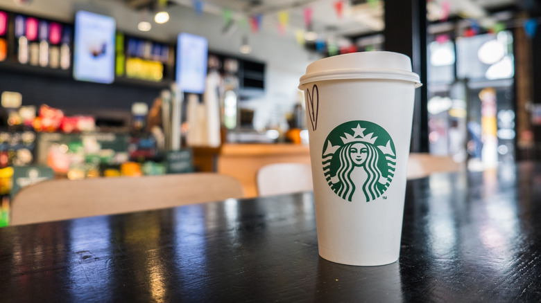 Starbucks cup on a counter