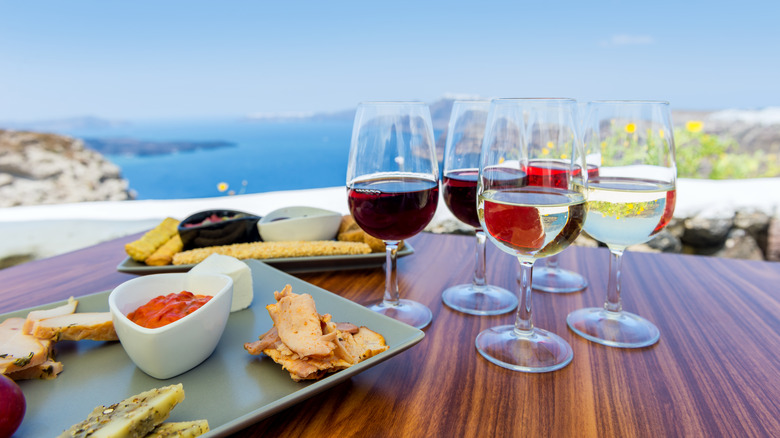 Variety of wines and food at Greek restaurant