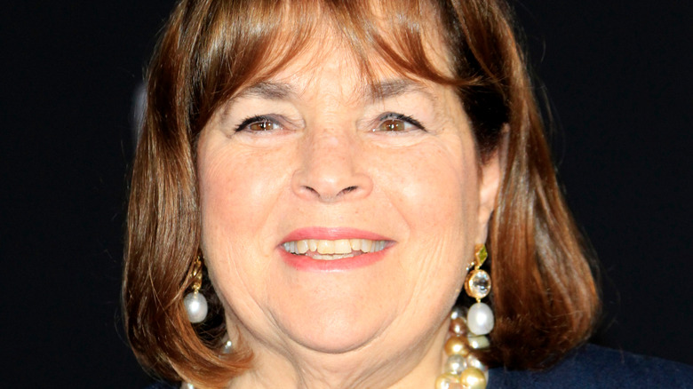 Ina Garten holding with microphone