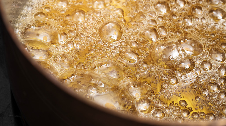 Caramel bubbles in pan