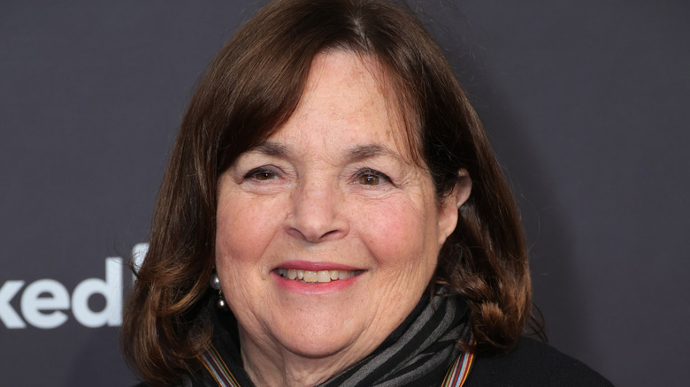 Ina Garten smiles on a red carpet