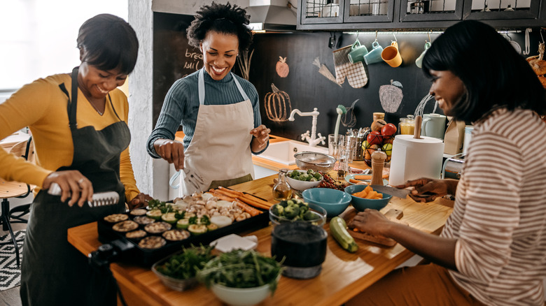 women cooking together