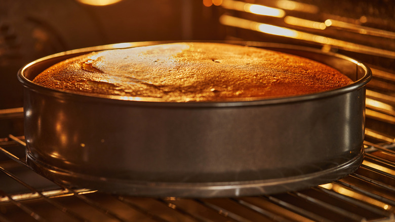 Round cake baking in the oven