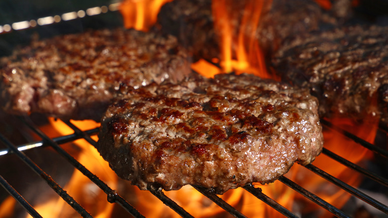 hamburger patties on grill