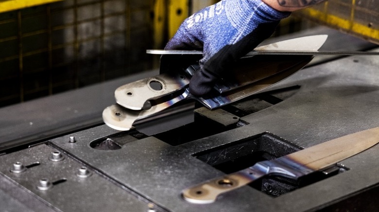 steel knives being forged