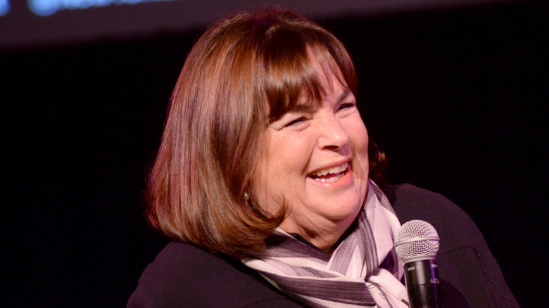 Ina Garten laughing into a microwave