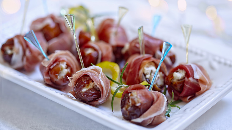 Dates stuffed with cheese wrapped in bacon